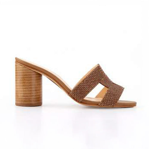 A pair of stylish beige heeled mules with a sparkling bronze beads embellished on a strap, featuring a chunky wooden heel and an H-shape open toe design.