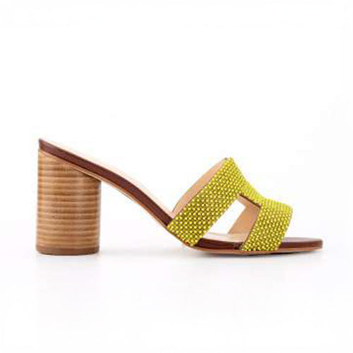 A pair of stylish beige heeled mules with a sparkling neon beads embellished on a strap, featuring a chunky wooden heel and an H-shape open toe design.