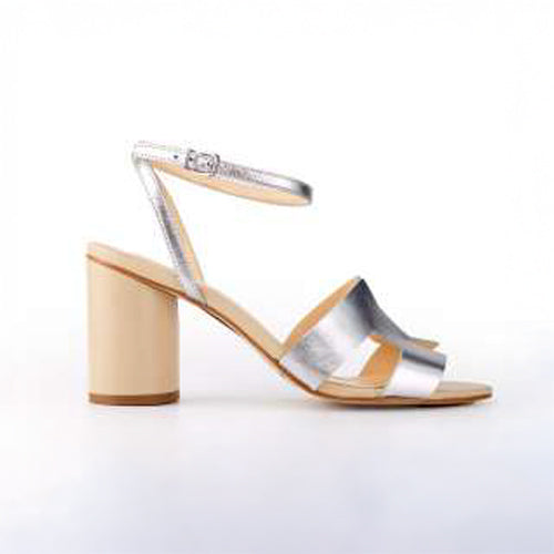 Silver strappy high-heeled sandals with a wide block heel and ankle strap on a white background.