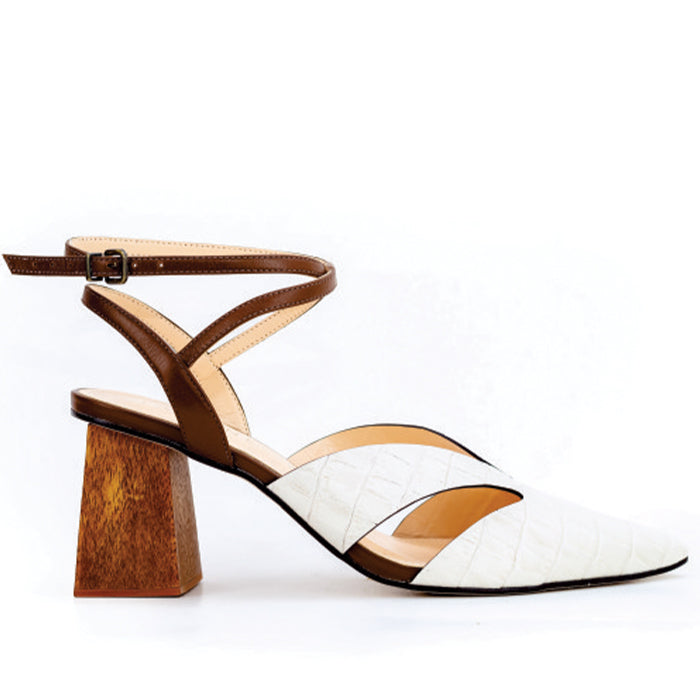 Off -white ankle-strap heel with a closed toe & pointed toe with wooden block heel, featuring stylish cutouts on the sides.